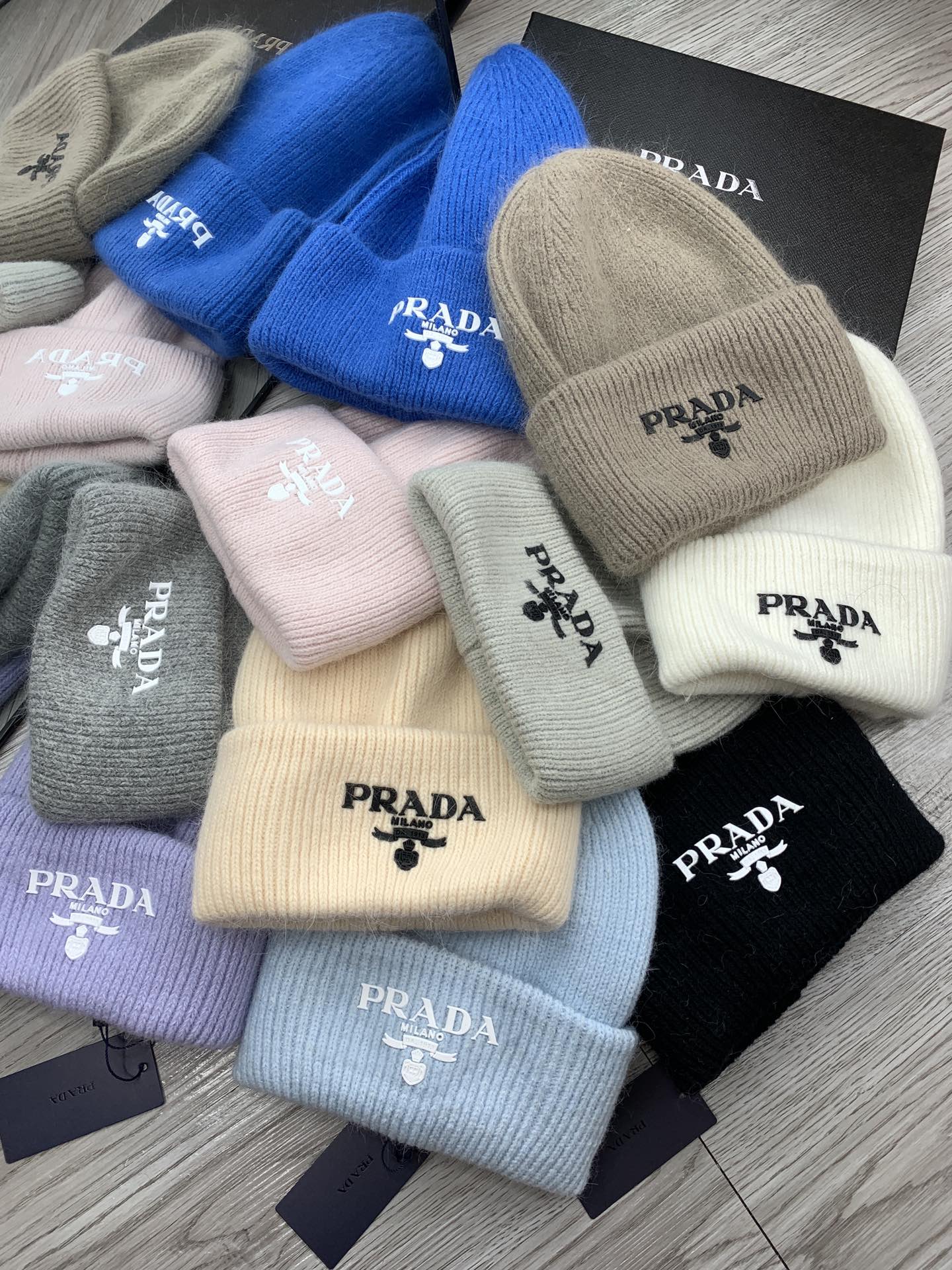 PRADA BEANIE HAT IN PALE GRAY WOOL 108746