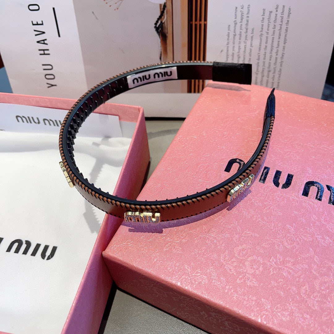 HEAD BAND IN BURNT ORANGE LAMBSKIN AND RESIN 417296